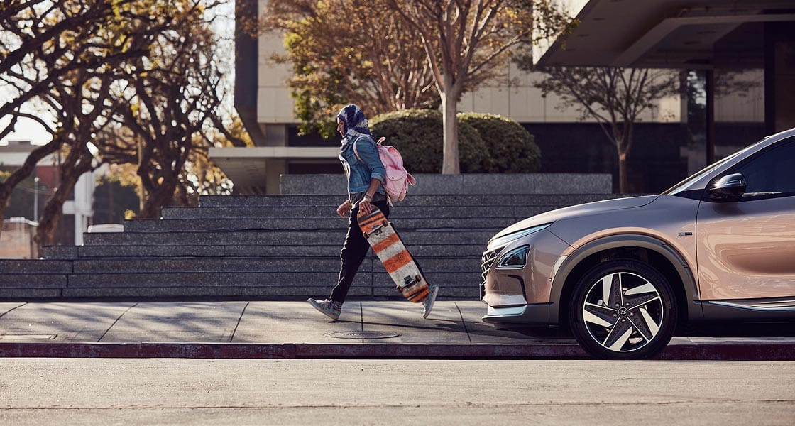 nexo 2019 side view with man